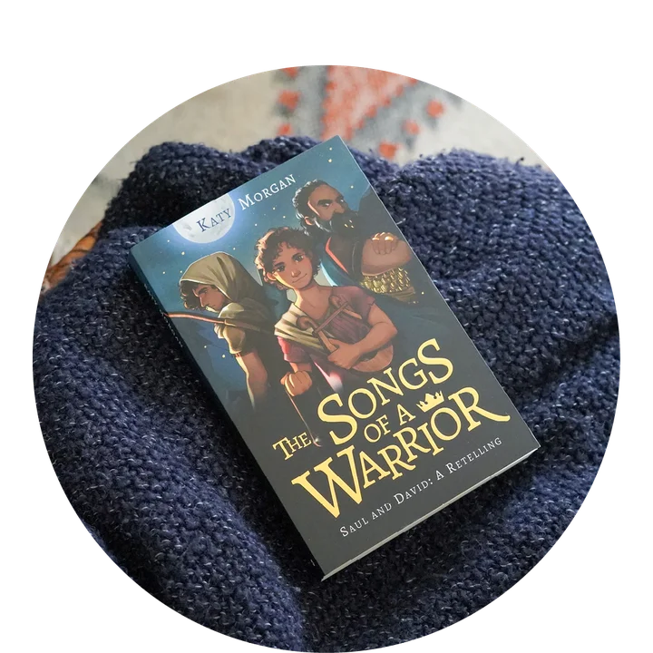 photograph of The Songs of a Warrior on a knit blanket